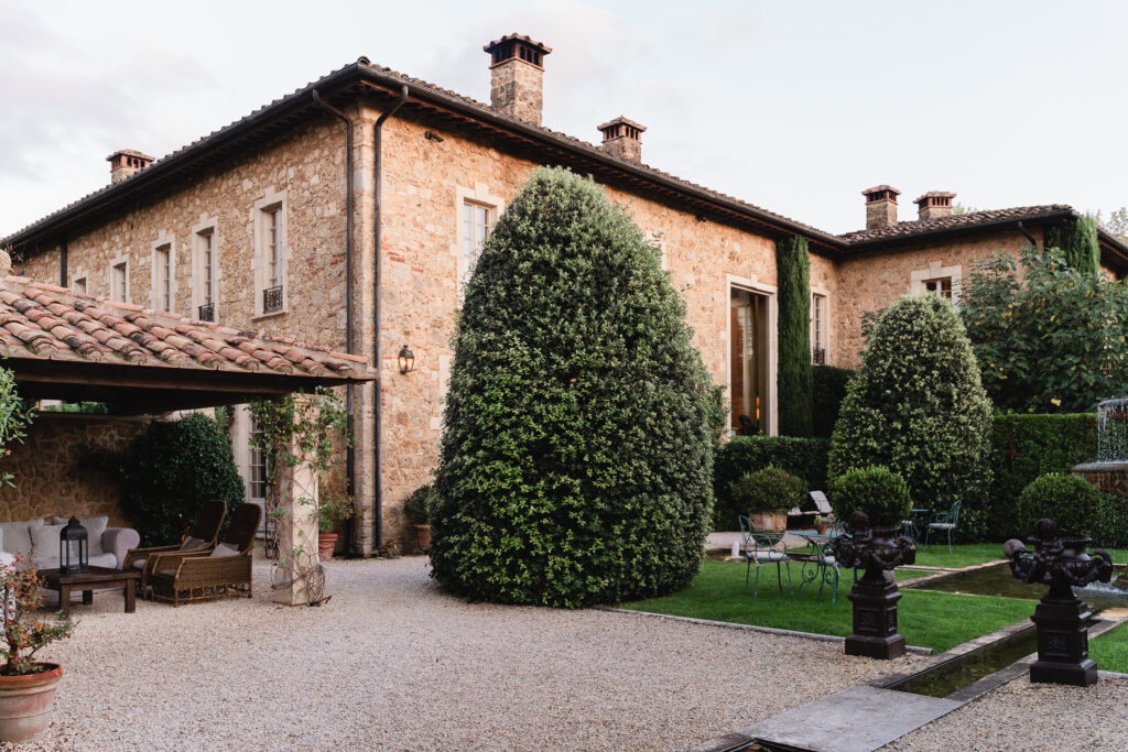 Bride and groom portraits in the gardens of Borgo Santo Pietro, Chianti Tuscany