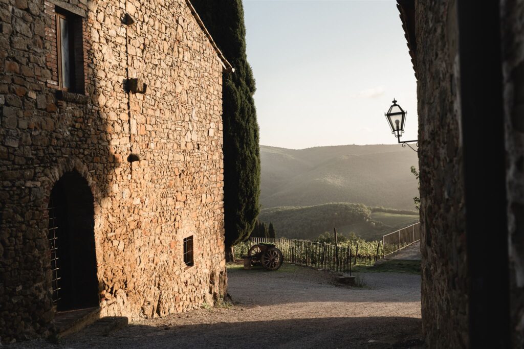 Wedding ceremony in the medieval courtyard of Borgo Castel Vecchi, Chianti