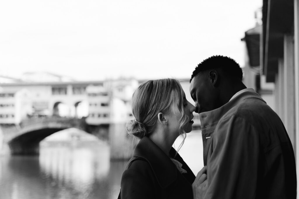 Timeless black and white wedding portrait with the historic Ponte Vecchio in the background.